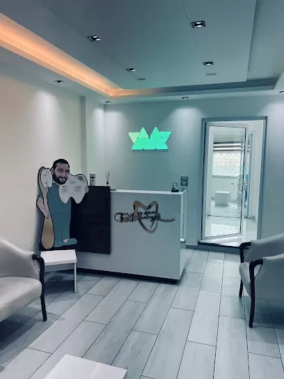 عيادة الدكتور عامر زنداقي لطب جراحة الفم و الأسنان