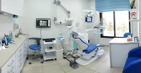 عيادة الدكتور أسامه هشام حرايري طب وجراحة الفم والأسنان